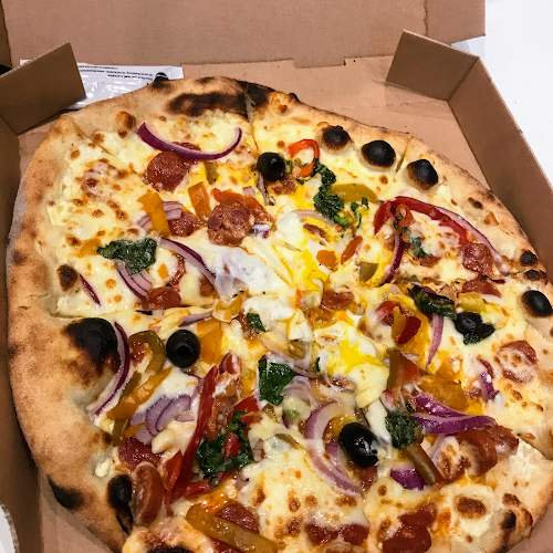 Pizza soleil l'authentique au feu de bois